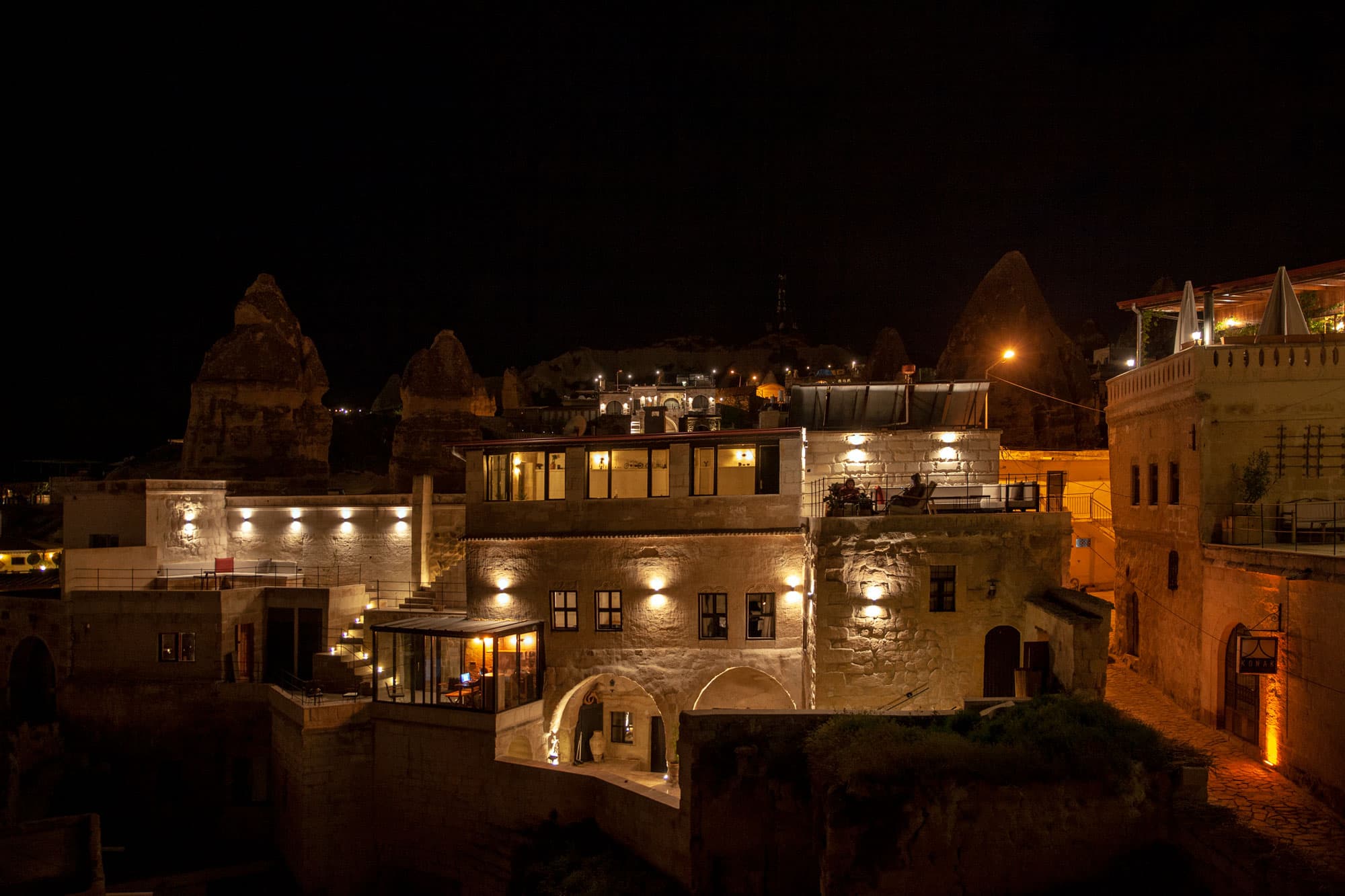 Sato Cave Hotel exterior with natural stone facade carved into the Cappadocian hillside